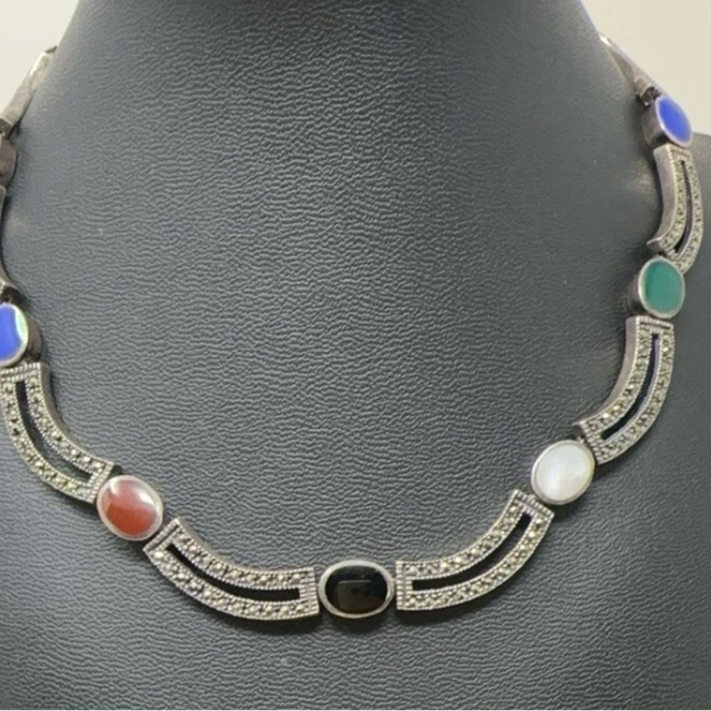Sterling silver/925 marcasite 17 inch necklace is set with 10 beautiful stones